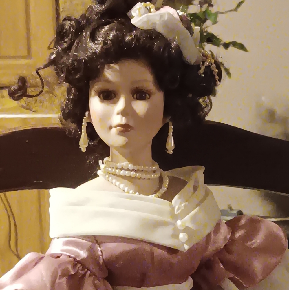 Elegant Pink and White Porcelain Doll